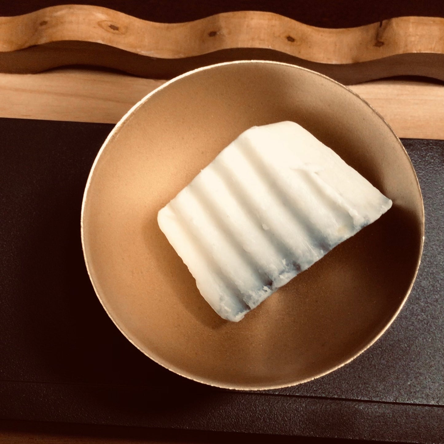 handmade organic creamy goat's milk and activated charcoal soaps for gently detoxed and moisturized skin for entire family