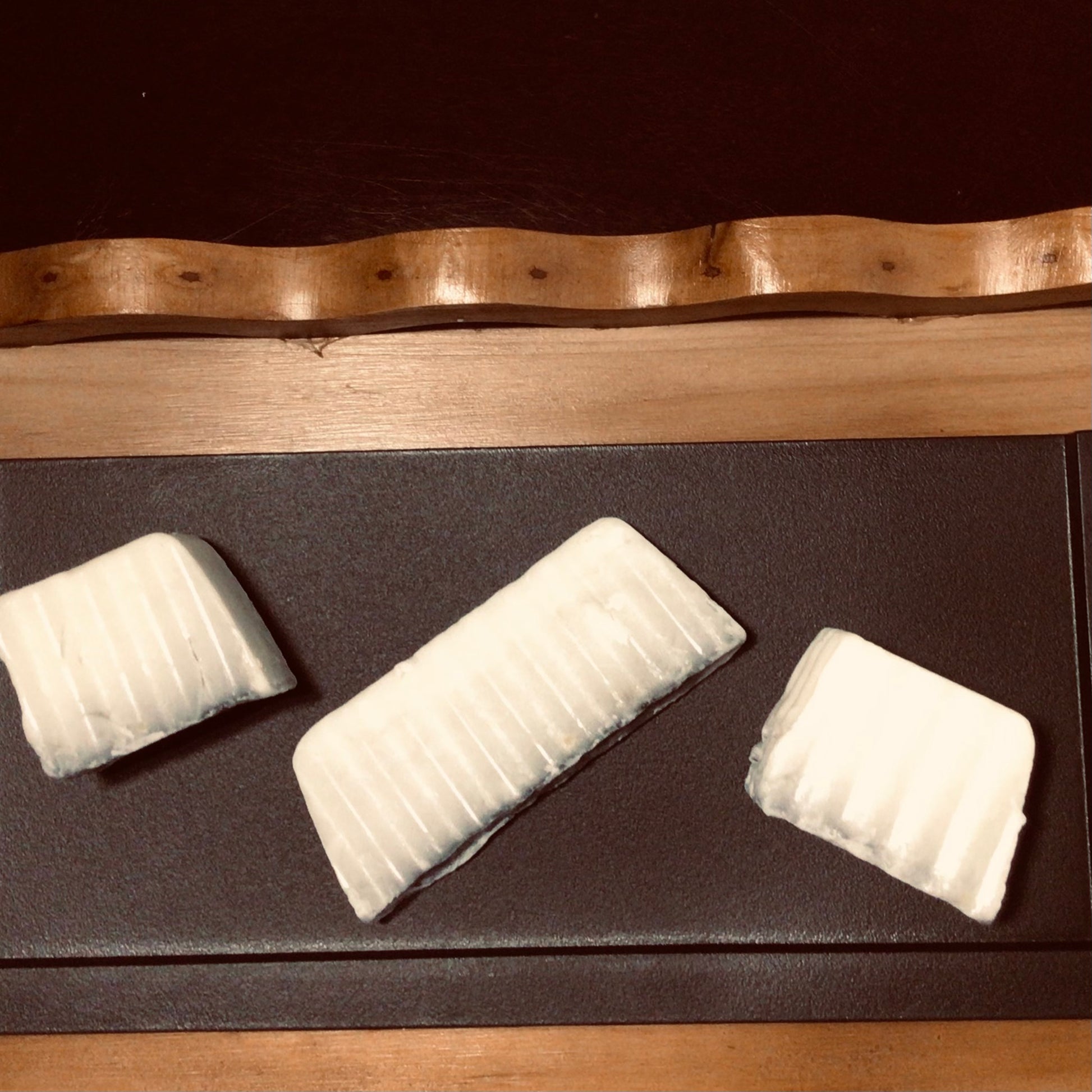 handmade organic creamy goat's milk and activated charcoal soaps for gently detoxed and moisturized skin for entire family