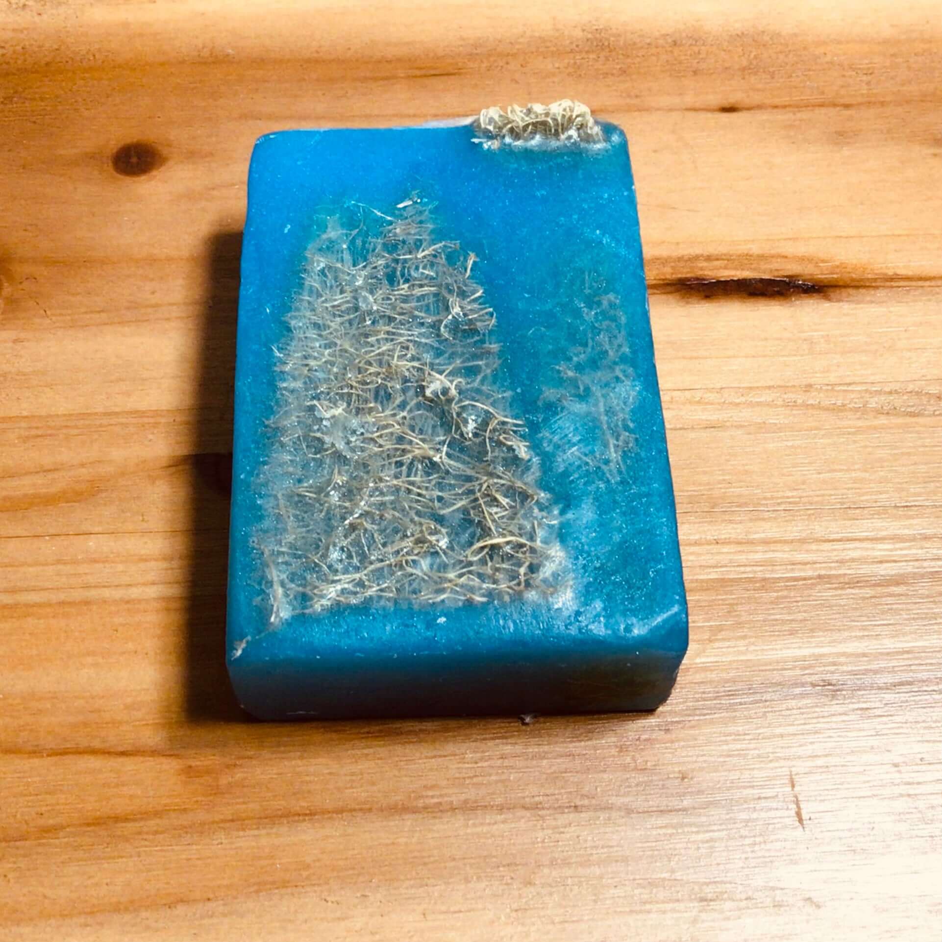 Handmade Organic Exfoliating Glycerin Soap with embedded loofah fruit or exfoliating cloth gently improves skin texture