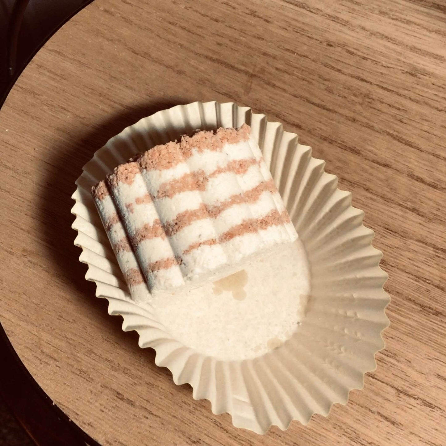 handmade organic small sized bath bombs with intricate molded patterns such as flowers and linear designs of pure ingredients