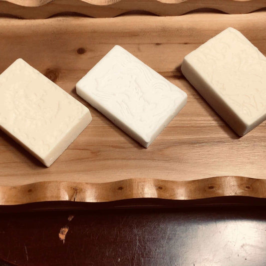 handmade organic creamy bar soaps with intricate molded patterns such as heart butterfly and dolphin made of pure ingredients