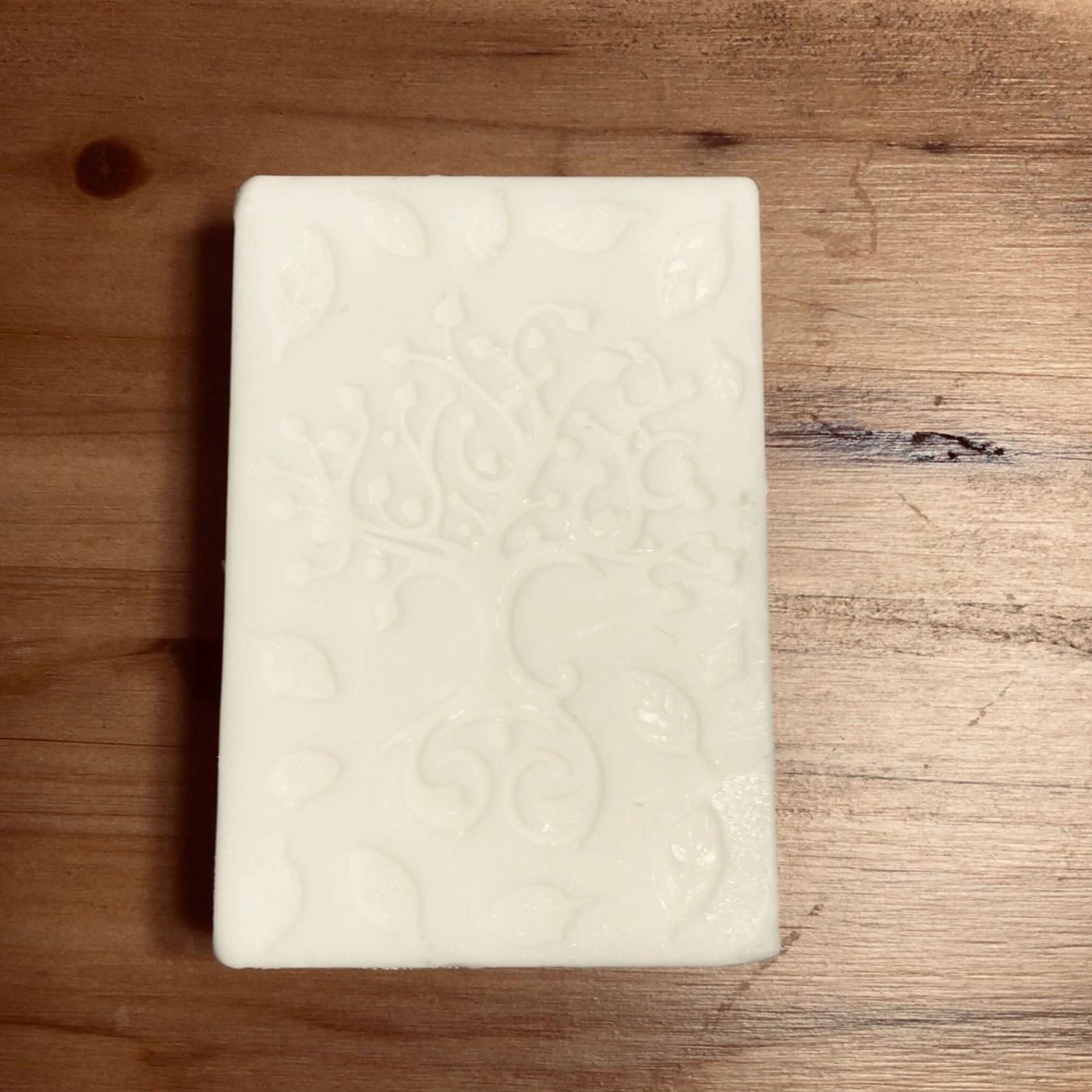 handmade organic creamy bar soaps with intricate molded patterns such as heart butterfly and dolphin made of pure ingredients