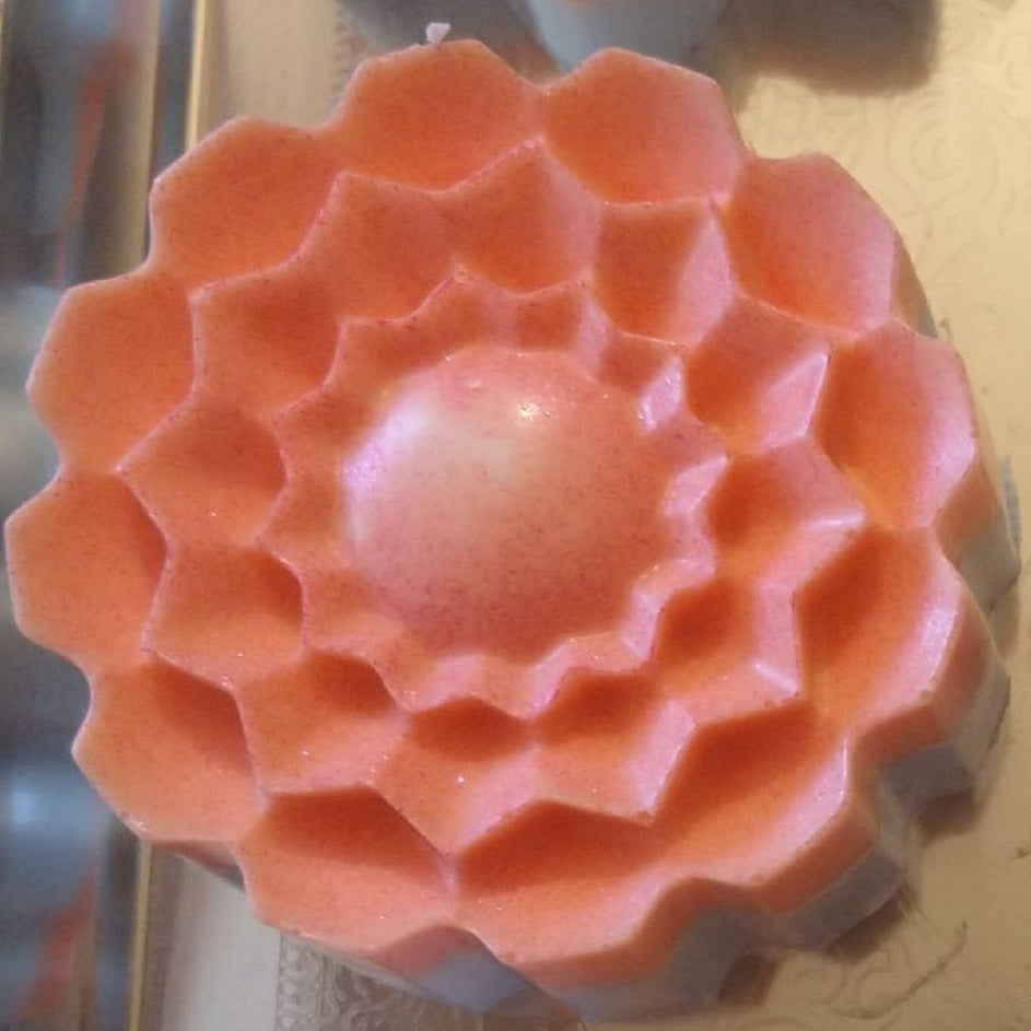 multi-layered ruffled petals with a tight raised center bud