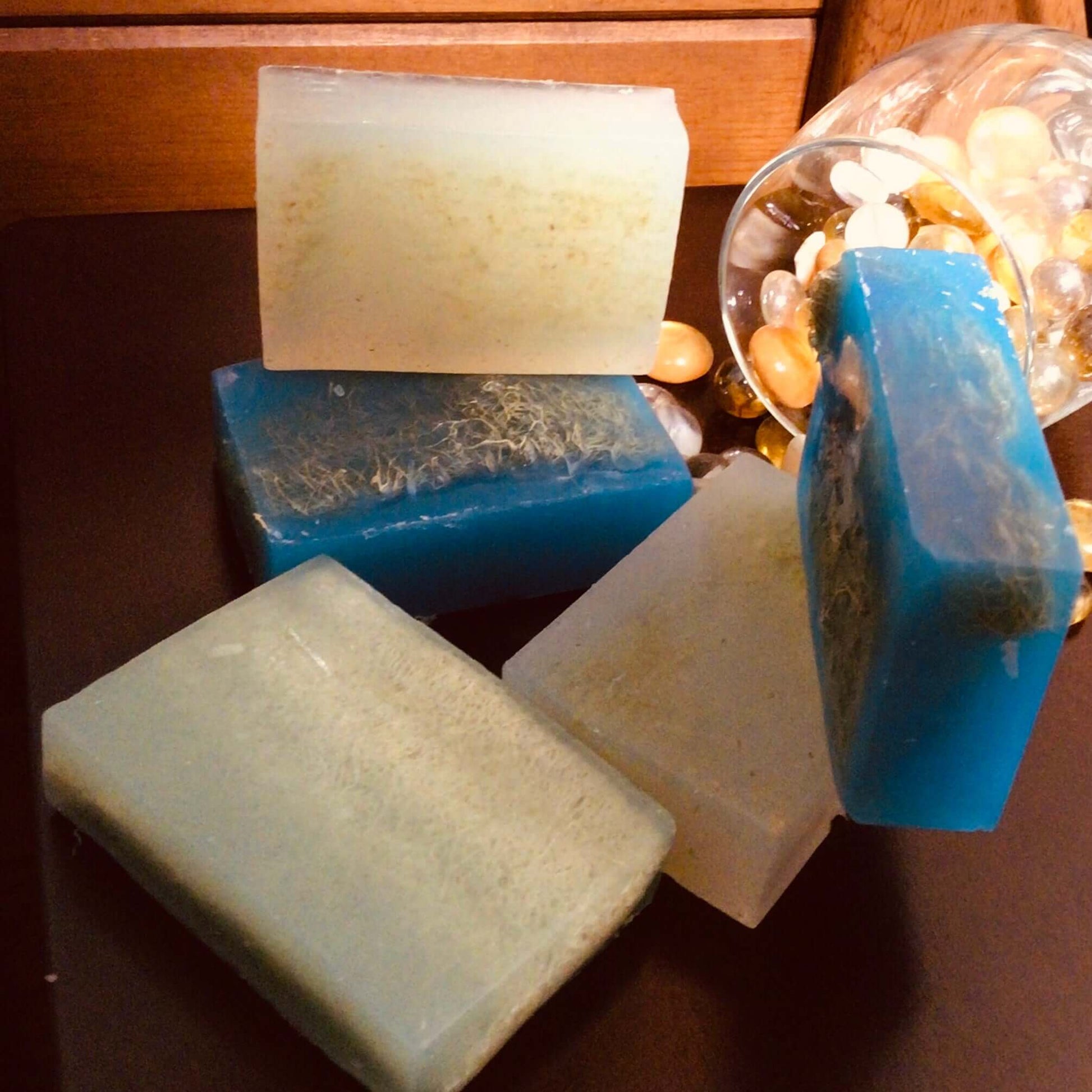 Handmade Organic Exfoliating Glycerin Soap with embedded loofah fruit or exfoliating cloth gently improves skin texture
