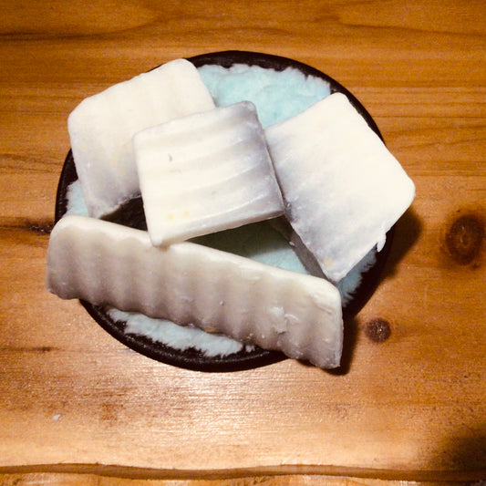 handmade organic creamy goat's milk and activated charcoal soaps for gently detoxed and moisturized skin for entire family