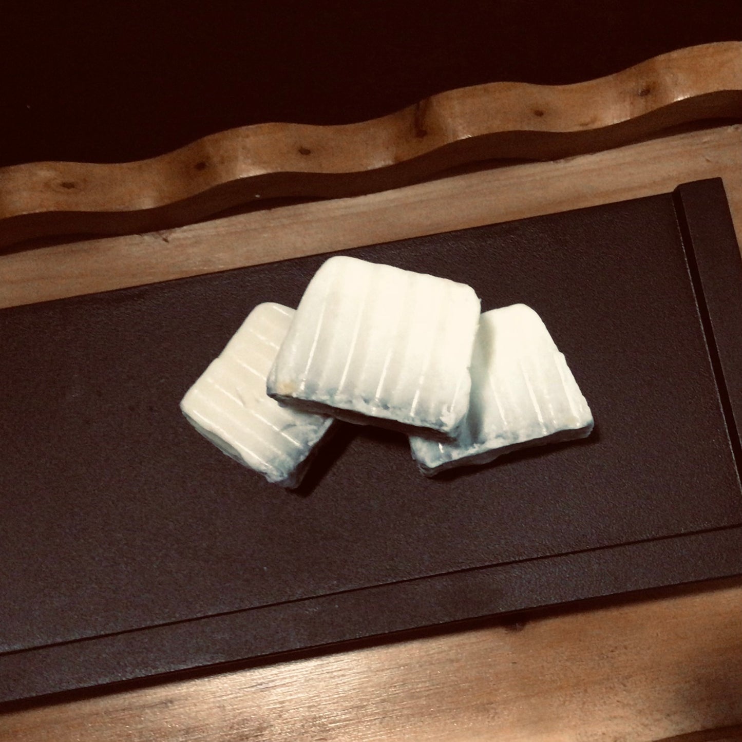 handmade organic creamy goat's milk and activated charcoal soaps for gently detoxed and moisturized skin for entire family