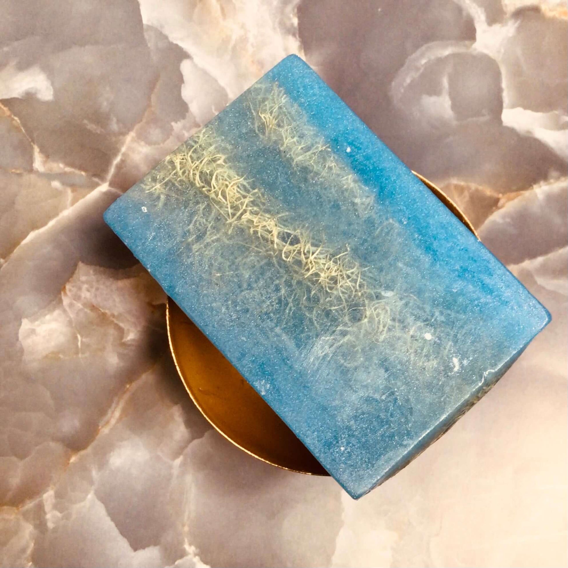 Handmade Organic Exfoliating Glycerin Soap with embedded loofah fruit or exfoliating cloth to gently smooth and refine skin