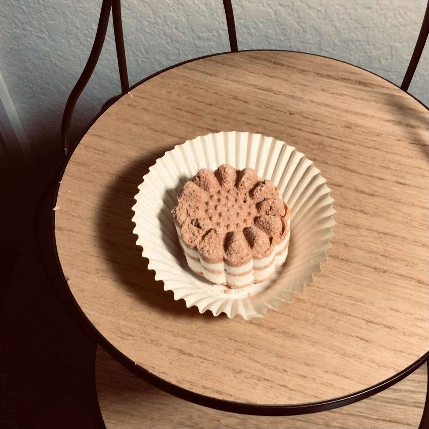 handmade organic small sized bath bombs with intricate molded patterns such as flowers and linear designs of pure ingredients