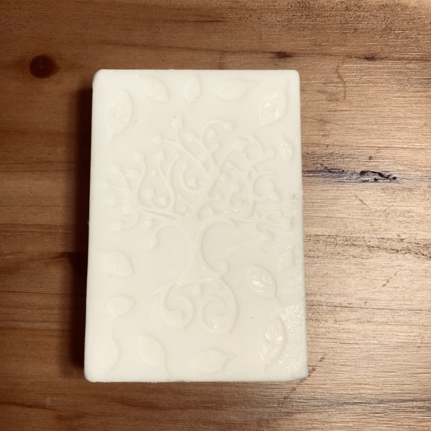 handmade organic creamy bar soaps with intricate molded patterns such as heart butterfly and dolphin made of pure ingredients